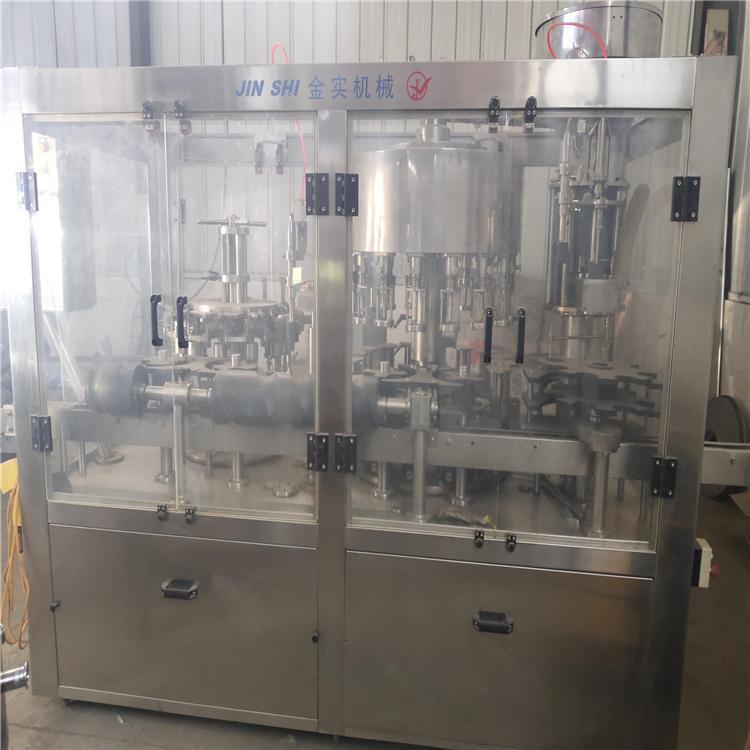 灌装机    三联体负压灌装机   三联体等压灌装机  冲瓶机  