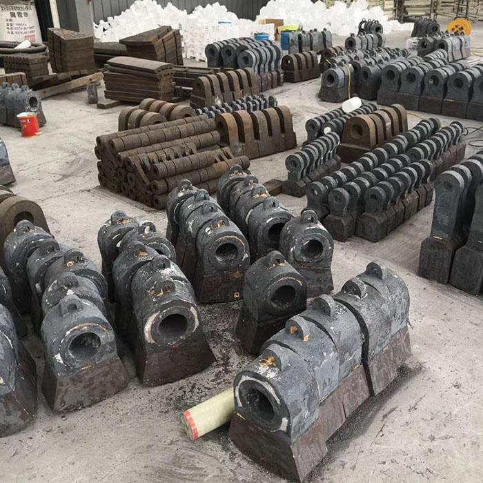 破碎机锤头的价格腾荣锤式破碎机耐磨锤头